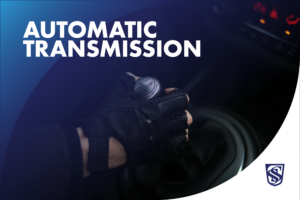Hand on a car automatic transmission